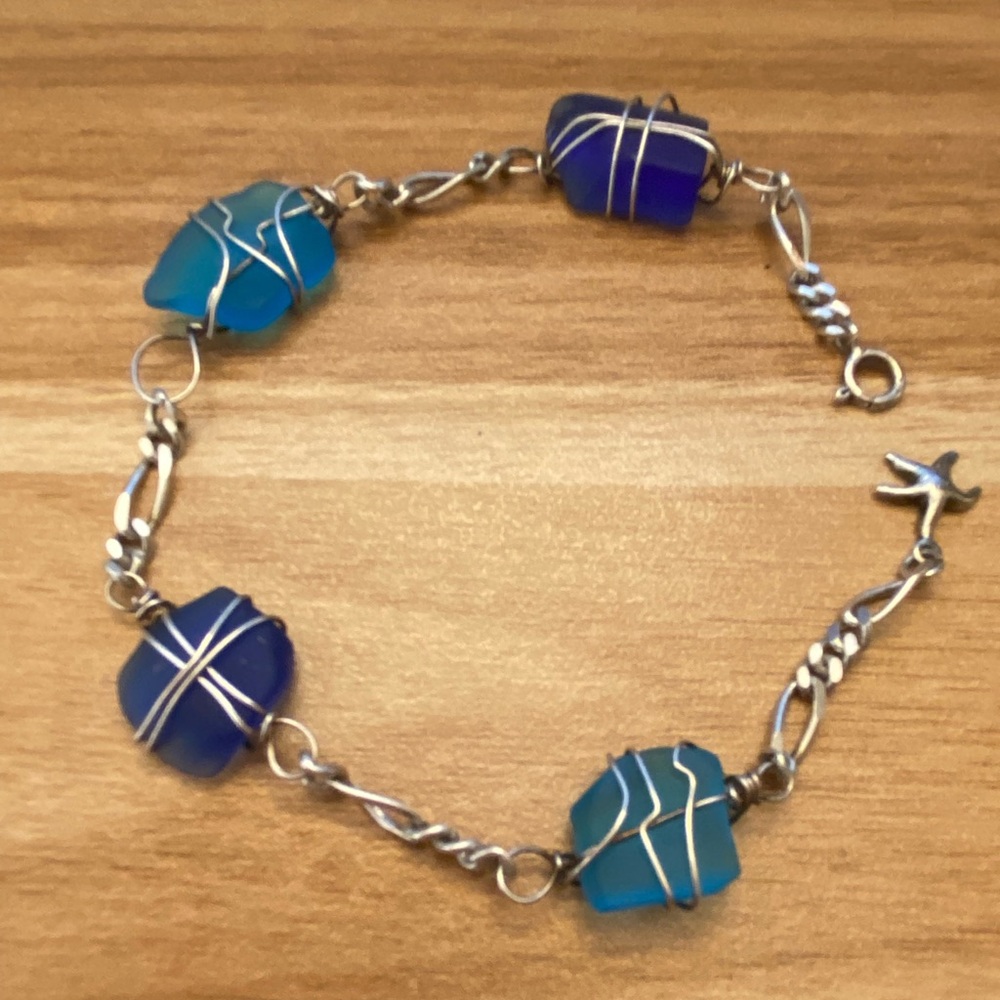 Adorable 925 sterling silver hand wrapped blue sea glass bracelet
